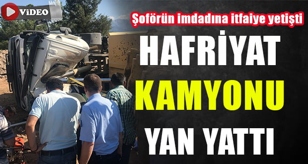 Yan Yatan Hafriyat Kamyonunun Şoförünü İtfaiye Kurtardı