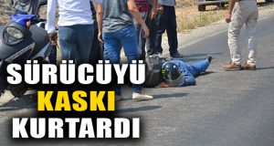 Motosiklet sürücüsünü kaskı kurtardı