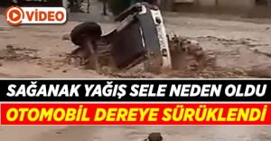 Sel sularında sürüklenen otomobil dereye düştü