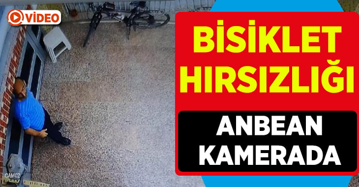 Binanın önüne konulan bisikletin çalınma anı güvenlik kamerasında