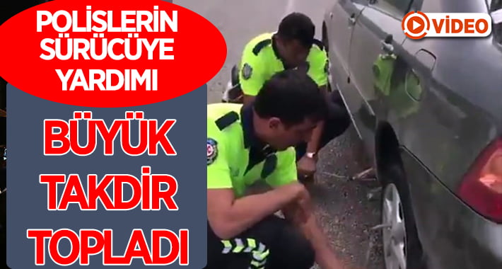 Yolda kalan sürücünün imdadına trafik polisleri yetişti