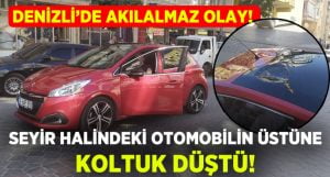 Seyir halindeki otomobilin üzerine koltuk düştü!