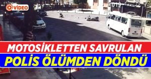 Motosikletten savrulan polis, dolmuşun altında kalıyordu