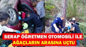 Otomobille takla atan öğretmen ağaçların arasına uçtu