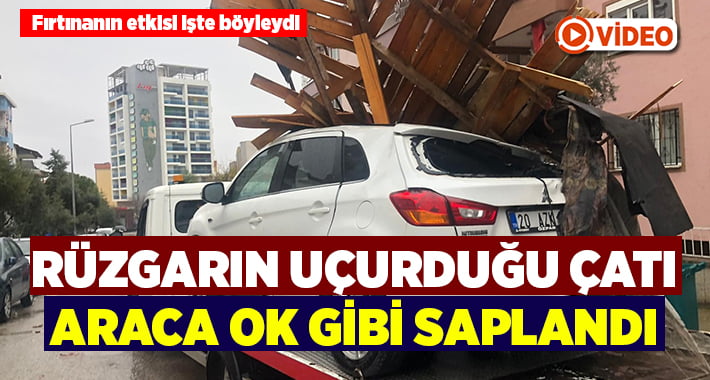 Rüzgarın uçurduğu çatının parçaları aracın tavanına ok gibi saplandı