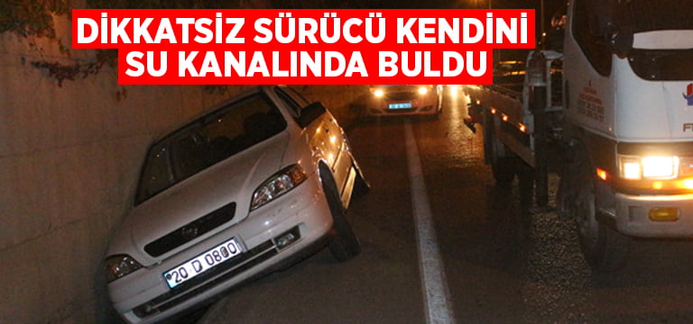 Dikkatsiz sürücü kendini sulama kanalında buldu