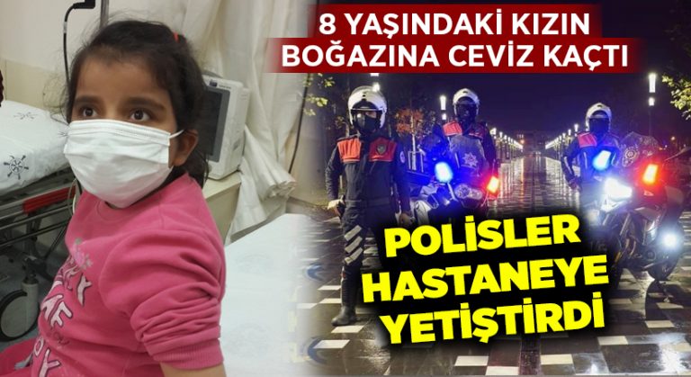 Boğazına ceviz kaçan küçük kızı polisler hastaneye yetiştirdi