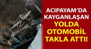 Kayganlaşan yolda otomobil takla attı!