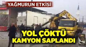 Denizli’de kamyon çöken yola saplandı