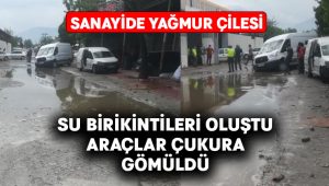 Sanayide yağmur çilesi.. Yol çöktü, araçlar askıda kaldı