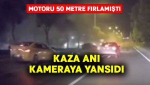 Motoru 50 metre fırlayan otomobilin kaza anı kameraya yansıdı