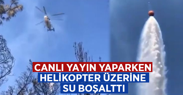 Canlı yayın yaparken helikopter üzerine su boşalttı!