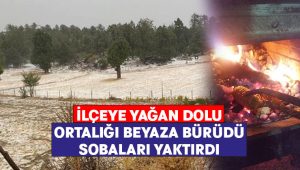 İlçeye yağan dolu sobaları yaktırdı