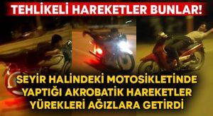 Tehlikeli hareketler bunlar! Seyir halindeki motosikletinde yaptığı akrobatik hareketler yürekleri ağızlara getirdi